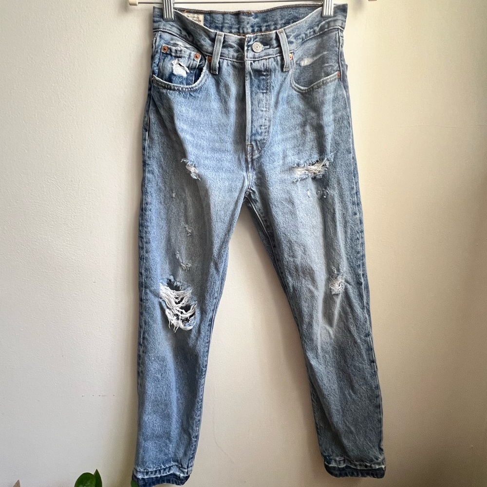 Levi’s 501 Distressed Light Blue Jeans